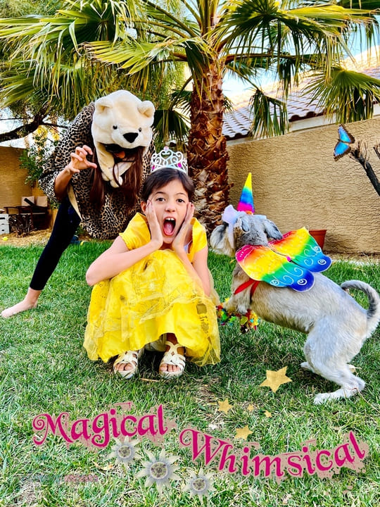 A thief in a panda hat and cheetah print cape trying to take the yellow dress up princess's crown and a rainbow unicorn fairy schnauzer dog is jumping excitedly in the grass.
