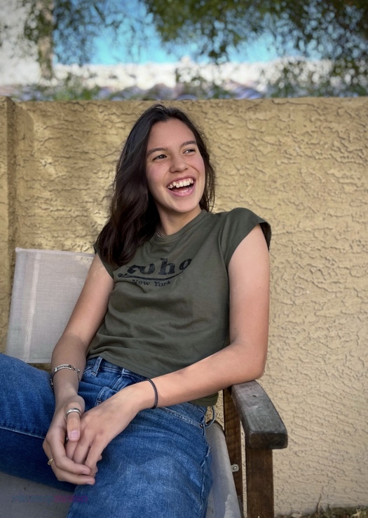 iPhone portraits of a dark haired girl in a green shirt and jeans sitting outside in a chair laughing. Pix Snap Mama is overlaid in the lower left corner